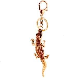 Sparkling crystal crocodile keychain in gold-tone metal for handbags and car keys