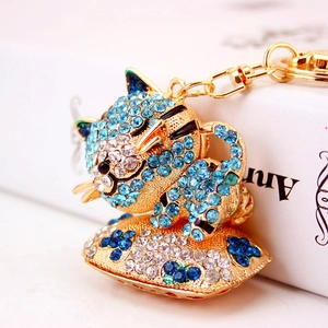 Portachiavi gatto con cristalli scintillanti blu e oro con chiusura a moschettone