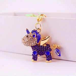 Sparkling blue and white crystal unicorn keychain with golden alloy wings and swivel clasp