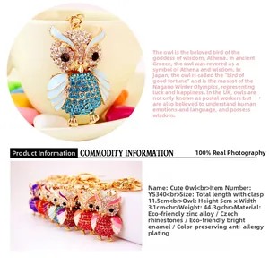 Detail of owl keychain featuring colorful rhinestones and zinc alloy metal finish