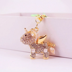 Sparkling pink rhinestone unicorn keychain with gold wings and white enamel details