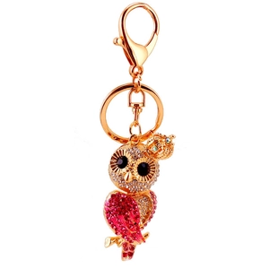 Porte-clés chouette dorée avec cristaux roses et blancs, petite couronne et fermoir