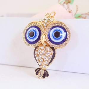 Porte-clés hibou scintillant avec motif œil bleu maléfique et placage en or