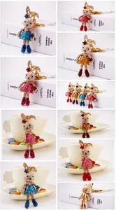 Close-up of cute rhinestone rabbit keychains in various colors with metallic hardware