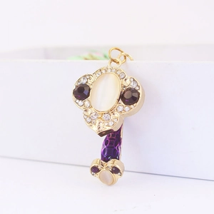 Chinese style Ruyi key keychain with white cat eye stone and purple gems in gold plating