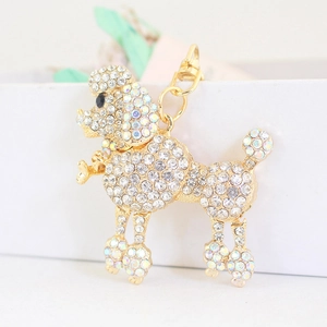 Sparkling crystal encrusted poodle keychain with golden alloy finish for bags