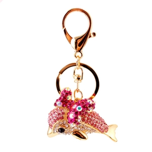 Sparkling rhinestone dolphin keychain with pink crystals and rose gold metal ring