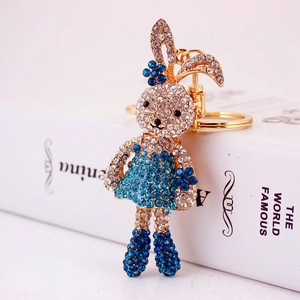 Creative rabbit keychain with sparkling blue and white rhinestones on golden alloy base