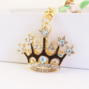 Creative crown keychain with black enamel and sparkling crystals on golden alloy