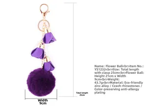 Detail view of purple leather flower keychain with faux fur ball and sizing parameters