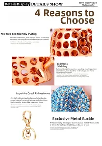 Macro detail of gold plated rhinestone hollow skull sphere keychain with metal lobster clasp