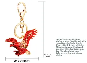 Vue macro du porte-clés aigle en cristal rouge étincelant avec alliage de zinc doré