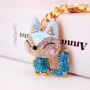 Cute fox keychain with blue rhinestones and gold plating for car keys or bag pendant
