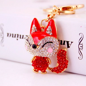 Sparkling fox keychain with red and white rhinestones and gold lobster clasp