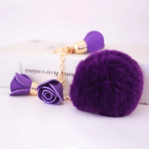 Fashionable purple faux fur pompom keychain with gold chain and rose flower charms