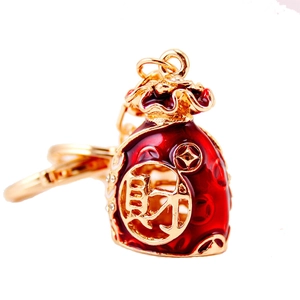 Creative Chinese style red fortune bag keychain with golden metal frame and crystals