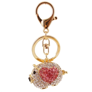 Golden heart pig keychain with red and white rhinestones for bags and accessories