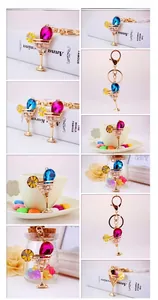 Detail view of crystal rhinestone cocktail glass keychains in multiple vibrant colors