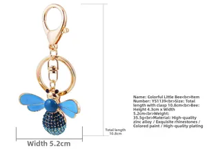 Detailed view of crystal bee keychain with size specs and blue rhinestone details