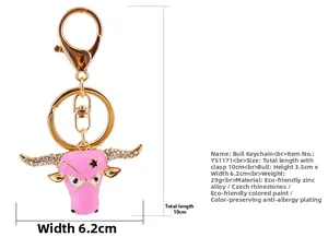 Pink enamel bull head keychain with Czech rhinestones showing detailed product dimensions