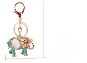Detailed specs of the blue cat eye elephant keychain with zinc alloy and rhinestones