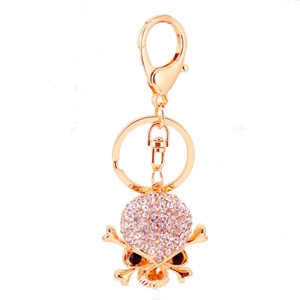 Golden skull keychain with sparkling rhinestones and metal lobster clasp for bags