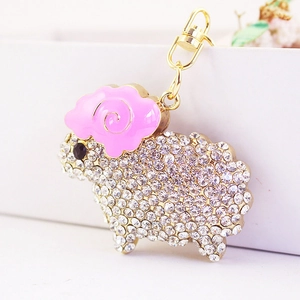 Sparkling rhinestone sheep keychain with pink enamel horns and gold-tone lobster clasp
