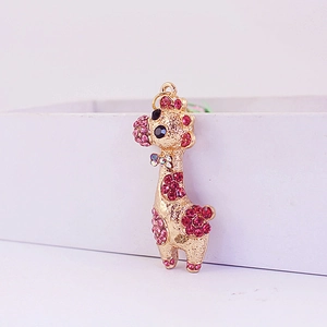 Porte-clés girafe en métal doré avec strass roses pour sacs et accessoires
