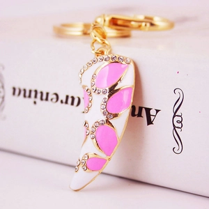 Creative horn instrument keychain with pink enamel flowers and sparkling rhinestones