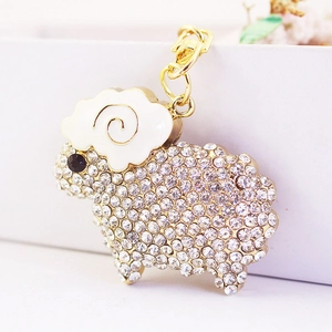 Cute rhinestone sheep keychain with gold lobster clasp and white enamel details