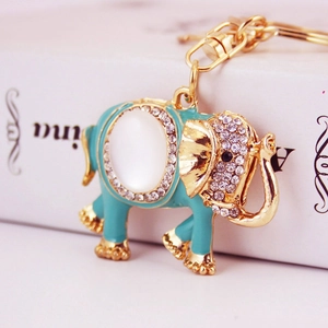Creative opal elephant keychain with blue enamel and sparkling crystal accents