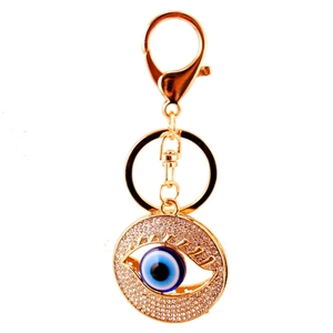 Sparkling gold evil eye keychain with blue crystal inlay and luxury rhinestone accents