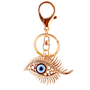 Creative blue evil eye keychain with rhinestones and eyelashes on gold metal base