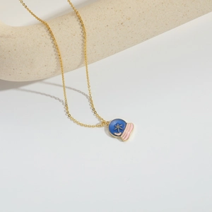Fashionable vintage gold chain necklace featuring a blue and pink enamel crystal ball pendant