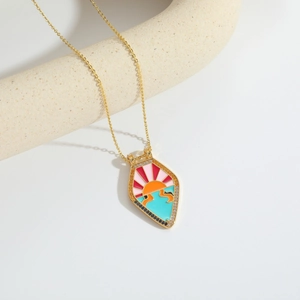 Macro detail of sun rising scenery enamel pendant with white and black zircons