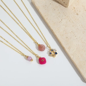 Charming gold chain necklaces with natural stone pendants and colorful star crystals