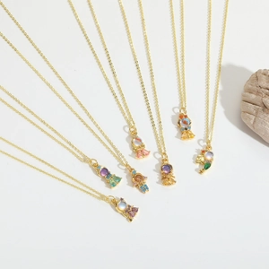 Colliers astronaute dorés minimalistes avec pendentifs en opale colorée et cristaux