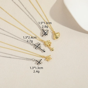 Ocean-themed necklace set with palm tree, starfish, and shell pendants in gold and silver