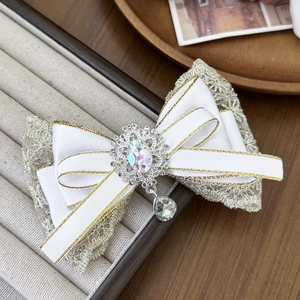 Elegant white lace bow hair clip with crystal gemstone and vintage drop pendant