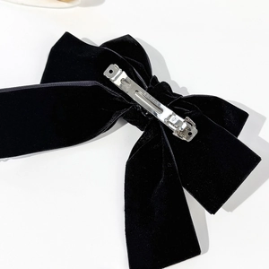 Elegant black velvet bow hair clip with premium metal spring fastener and vintage style