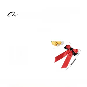 Detailed view of bicolor ribbon bow hair clip with size dimensions and red black fabric texture