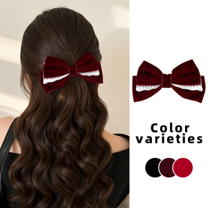 Elegant red velvet and lace bow hair clip for women featuring vintage aesthetic style
