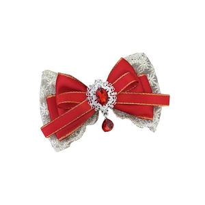 Elegant red silk bow hair clip with lace, gemstone, and vintage court style design
