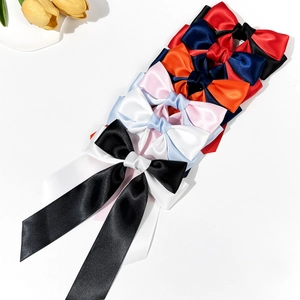 Colorful satin bow hair clip set featuring long ribbons for women elegant hair accessories