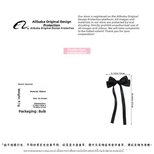 Detail view of a 27cm black silk bow hair clip with long ribbons and measurements