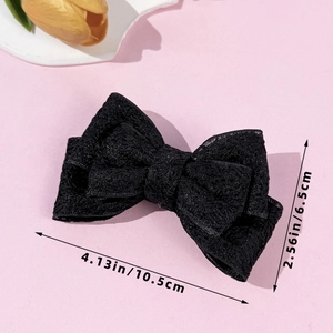 Detailed view of elegant black lace bow hair clip with 10.5cm size measurement display
