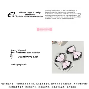 Detail view of pink and black lace bow hair clip with dimensions and ribbon texture