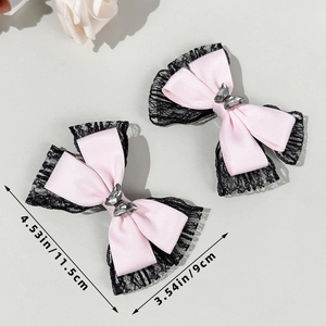 Pink satin bow hair clips with black lace edges and crystal butterfly accents, set of two