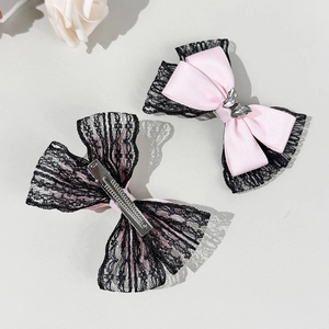 Pink satin and black lace bow hair clips set with sparkling crystal butterfly details