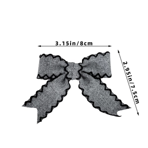 Detailed size chart showing 8cm width and 7.5cm height of the grey bow hair clip